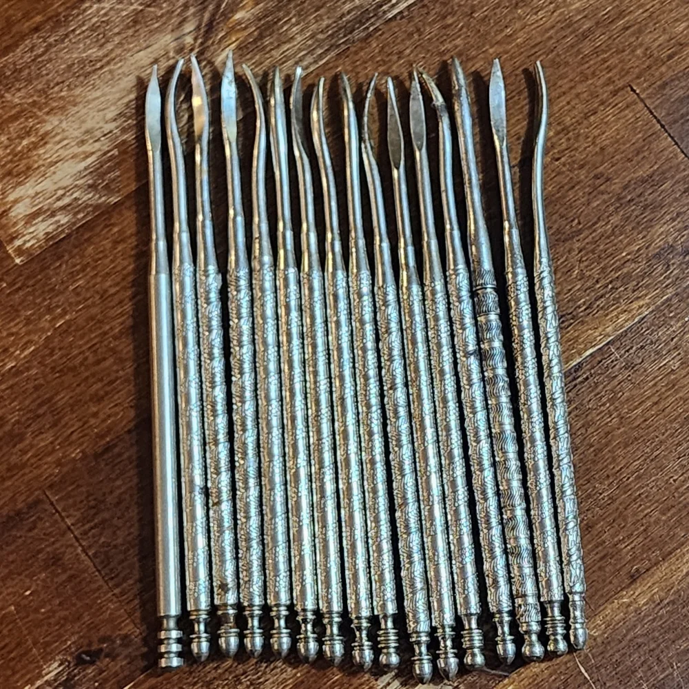 Vintage HMQ Henry Marcus Quackenbush Silver Toned Nutcracker and Picks Set of 20